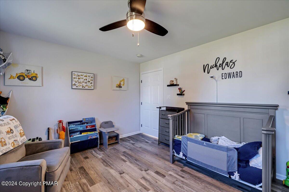 439 5 Points Richmond Road Bangor, PA 18013 - Photo 35 of 50 a living room with furniture and a baby crib