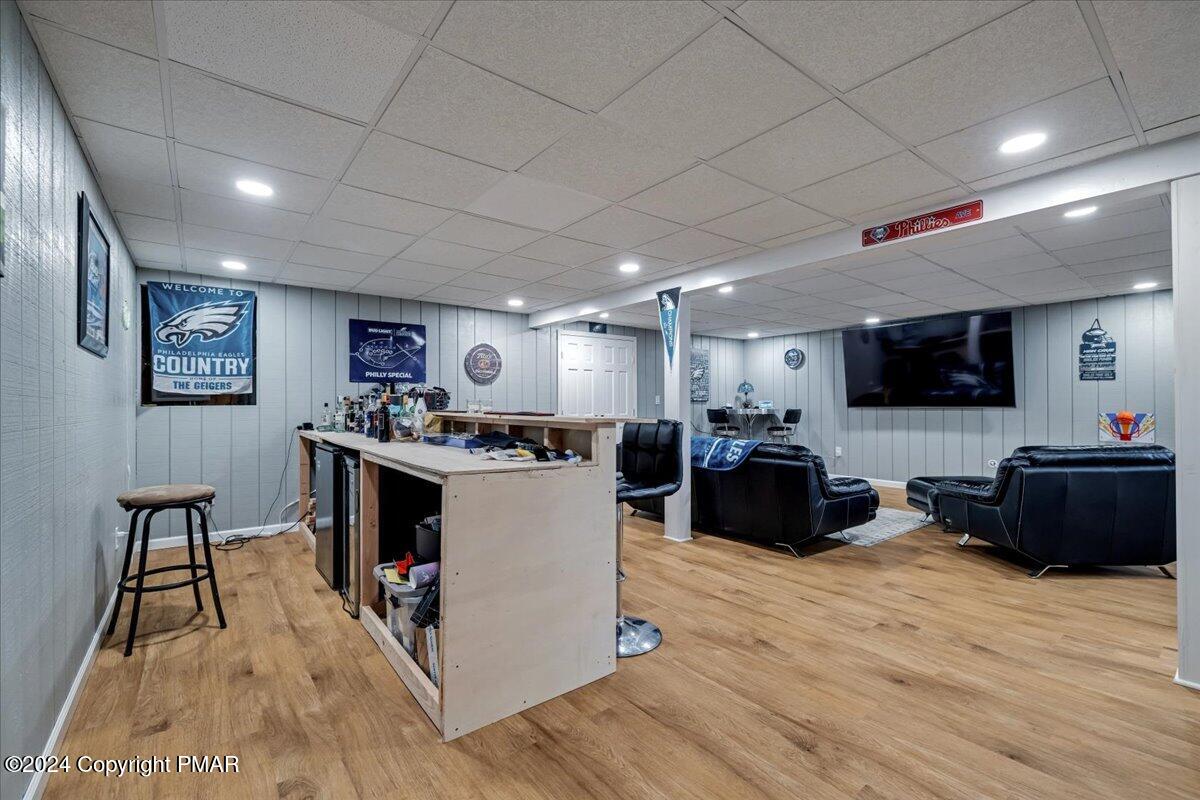 439 5 Points Richmond Road Bangor, PA 18013 - Photo 36 of 50 a living room with furniture a flat screen tv and kitchen view