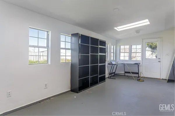 an empty room with windows