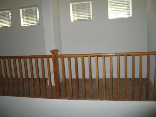 1333 South Martingale Road Gilbert, AZ 85296 - Photo 4 of 12 Stair rail upstairs