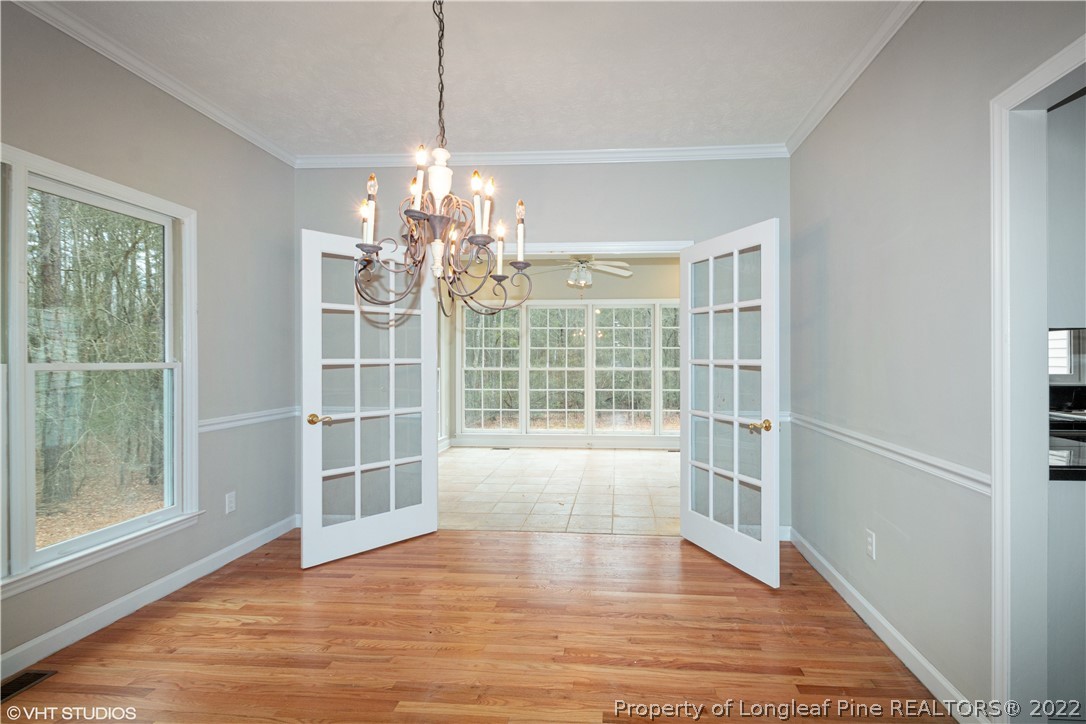 175 Lakeshore Drive Rockingham, NC 28379 - Photo 8 of 25 a view of a windows and wooden floor in a room