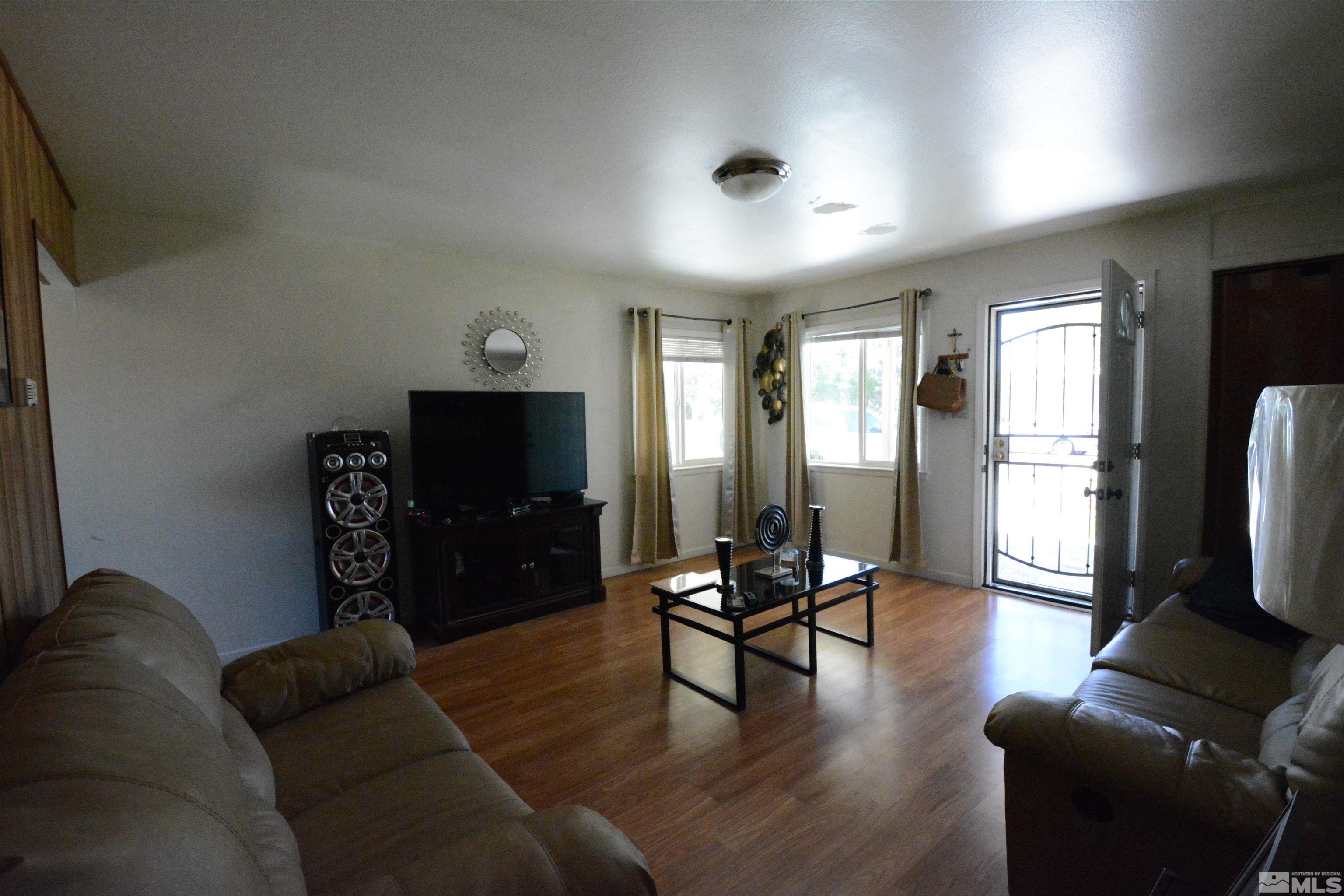 1930 Trainer Way Reno, NV 89512 - Photo 16 of 24 a living room with furniture and a flat screen tv