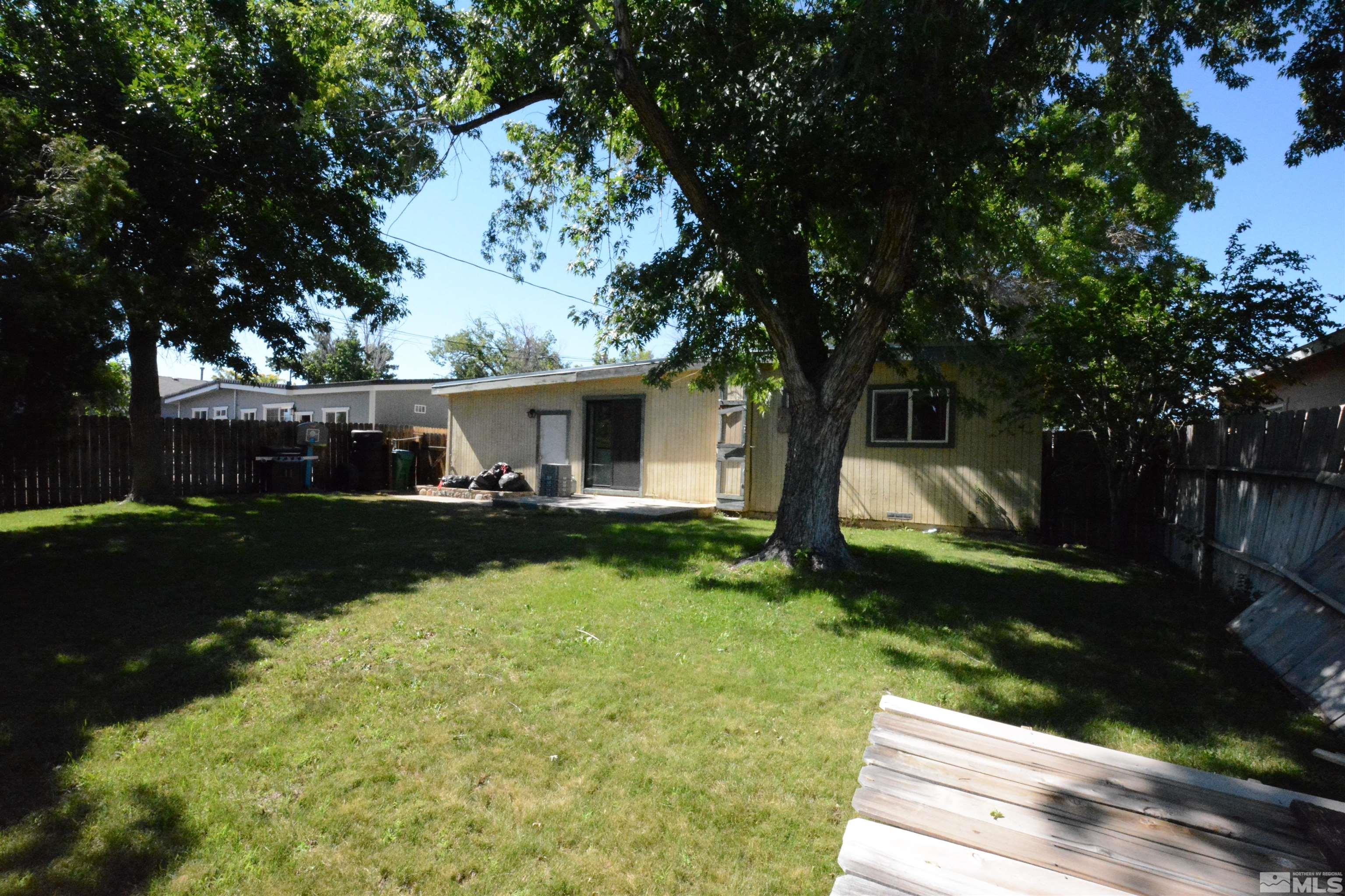 1930 Trainer Way Reno, NV 89512 - Photo 21 of 24 a front view of a house with garden