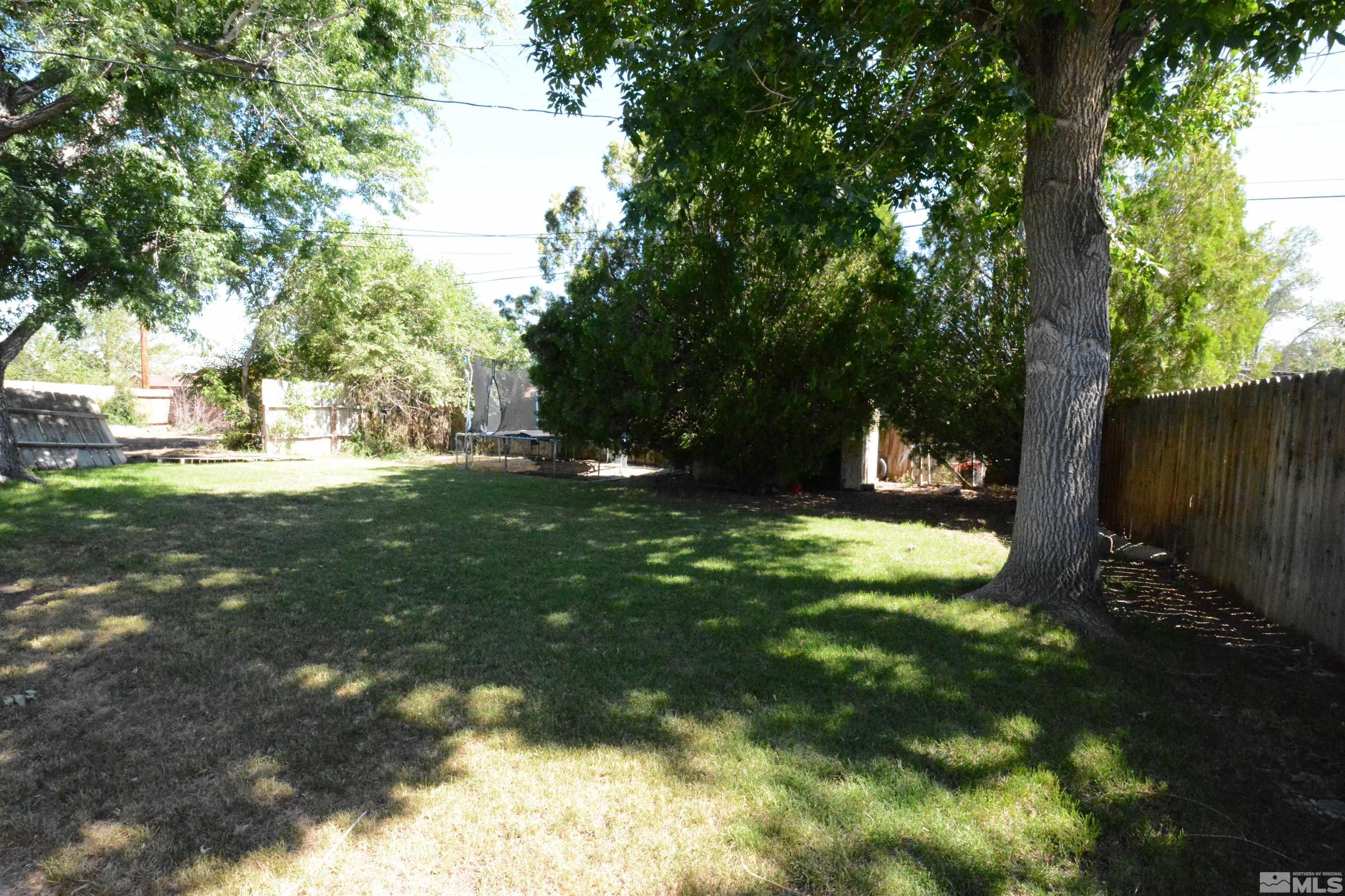 1930 Trainer Way Reno, NV 89512 - Photo 22 of 24 a view of outdoor space with deck and yard