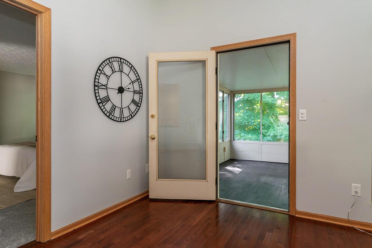 77 Beech Court Delaware, OH 43015 - Photo 24 of 34 exit to sun room