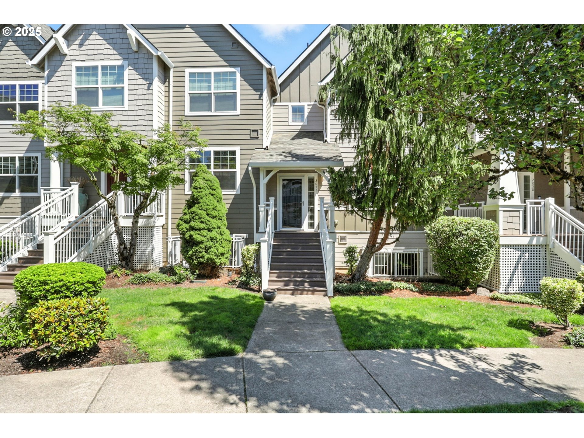 2052 Northwest Fargo Loop Camas, WA 98607 - Photo 1 of 44 a front view of a house with garden