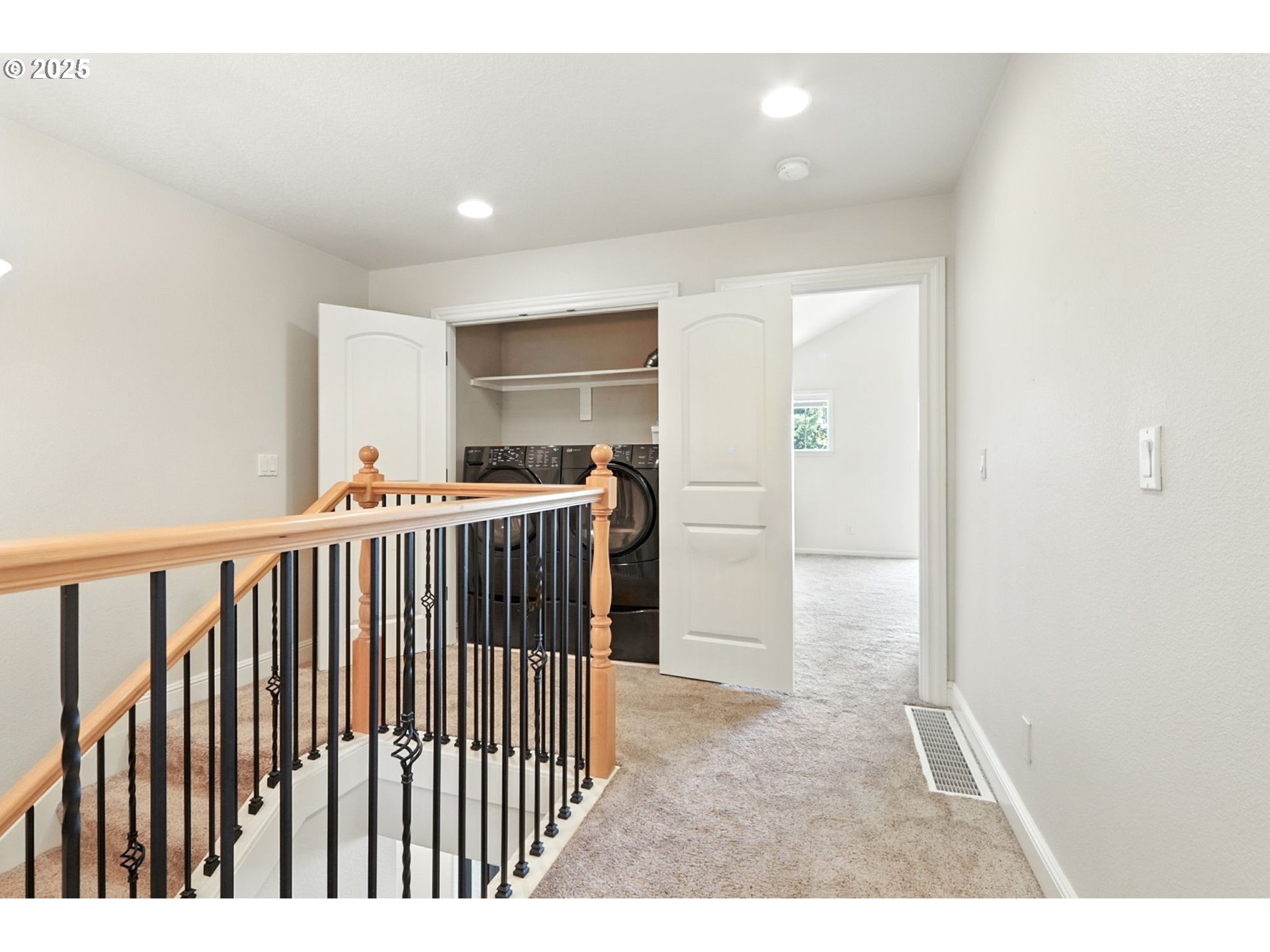2052 Northwest Fargo Loop Camas, WA 98607 - Photo 12 of 44 a view of a hallway with a kitchen