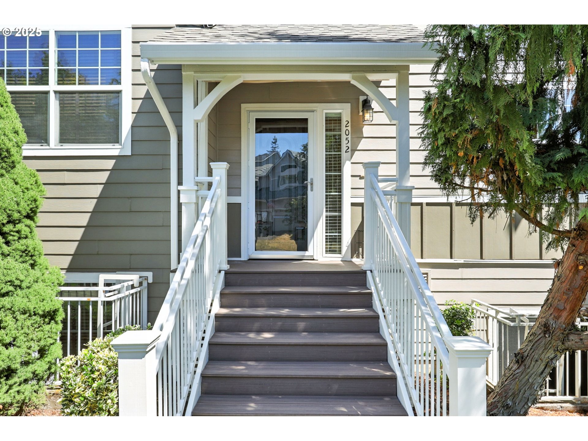 2052 Northwest Fargo Loop Camas, WA 98607 - Photo 2 of 44 a front view of a house with a garden