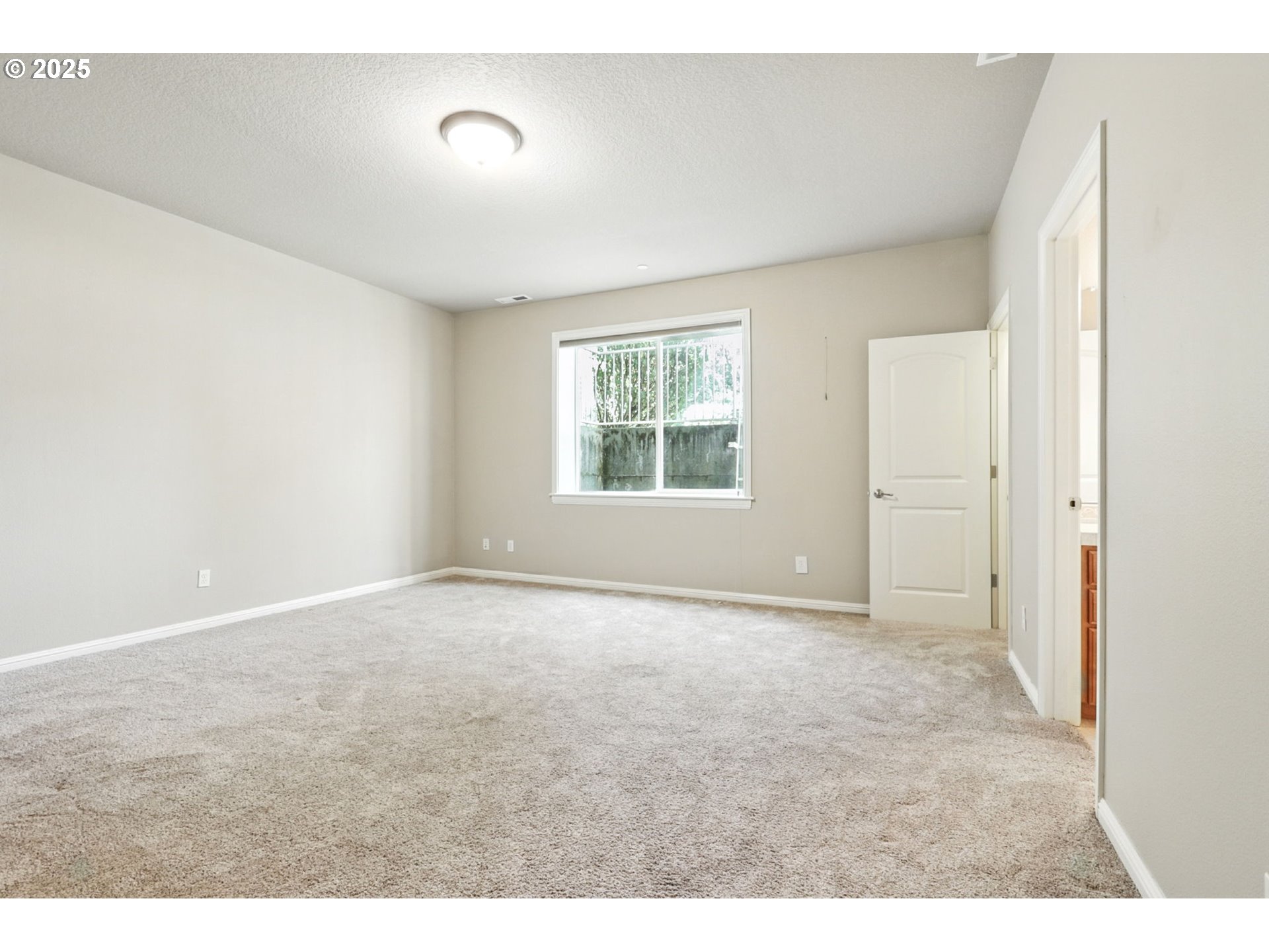 2052 Northwest Fargo Loop Camas, WA 98607 - Photo 25 of 44 a view of an empty room with a window
