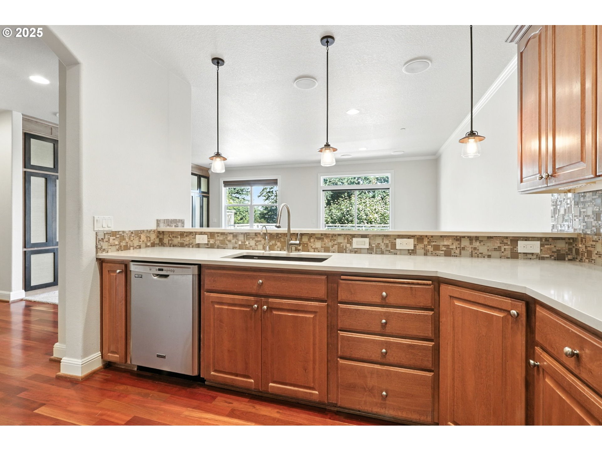 2052 Northwest Fargo Loop Camas, WA 98607 - Photo 3 of 44 a kitchen with a sink window and cabinets