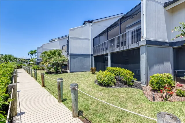 a house with garden in front of it