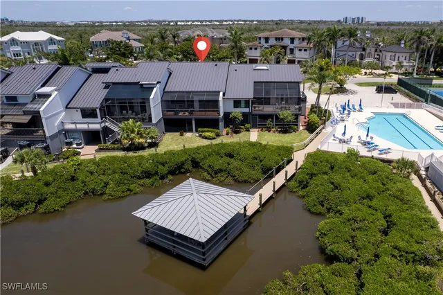 a view of a balcony with chairs and a table