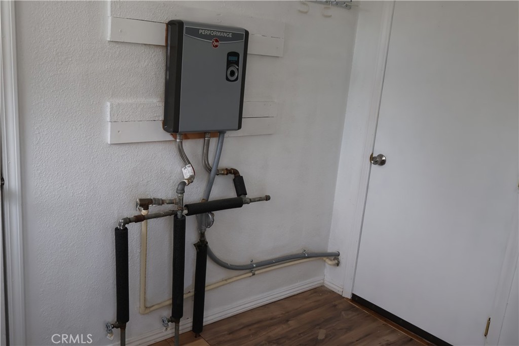 1410 4th Corning, CA 96021 - Photo 18 of 26 a view of hallway with wooden floor
