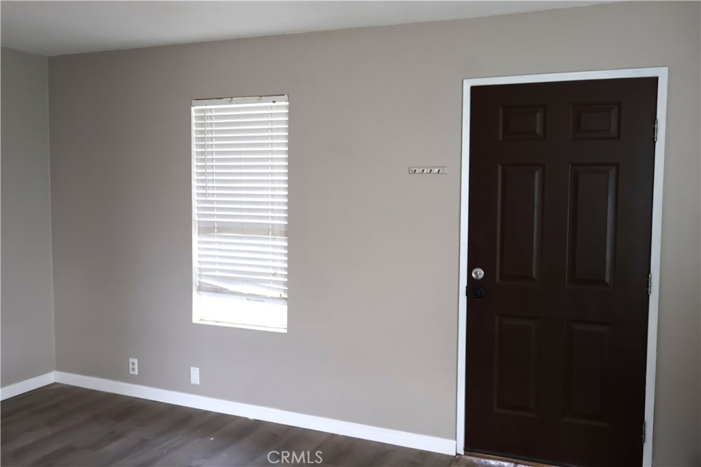 1410 4th Corning, CA 96021 - Photo 23 of 26 a view of an empty room with wooden closet