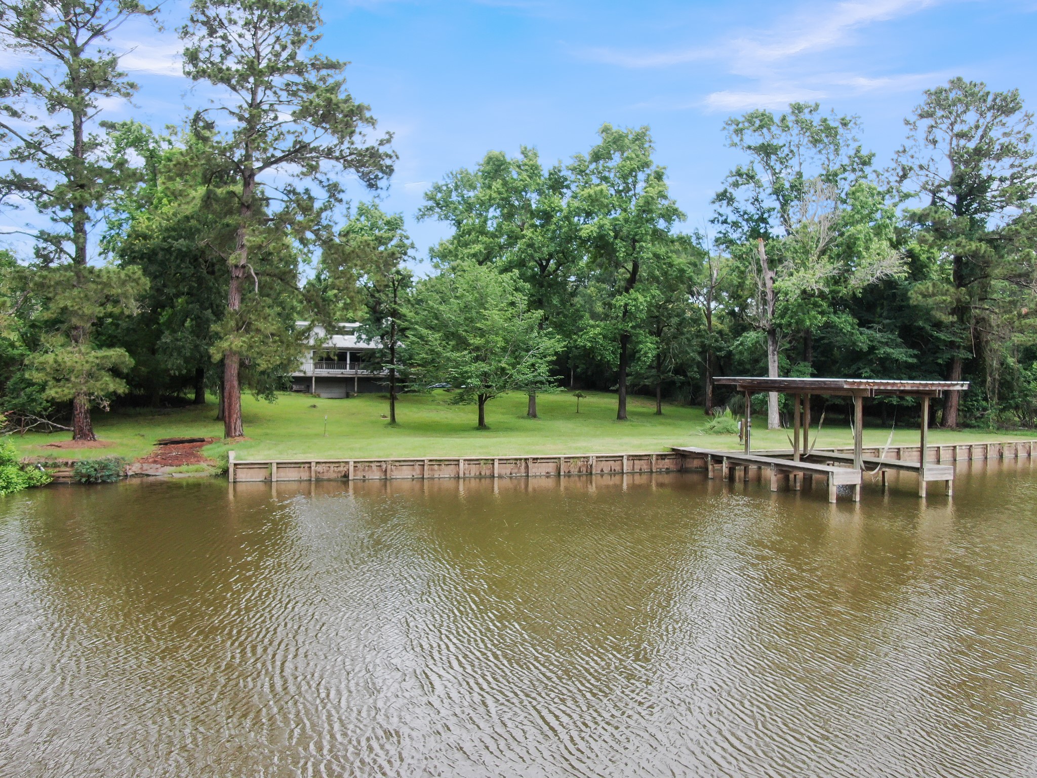a view of a swimming pool with a lake view