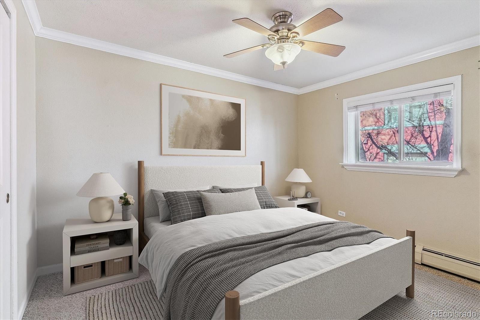 1330 Elizabeth Street, Unit 8 Denver, CO 80206 - Photo 12 of 15 a bedroom with a bed and a chandelier