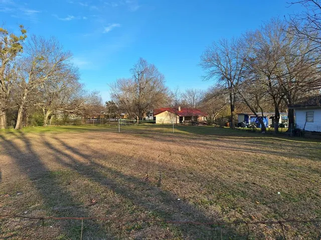 a view of road with houses