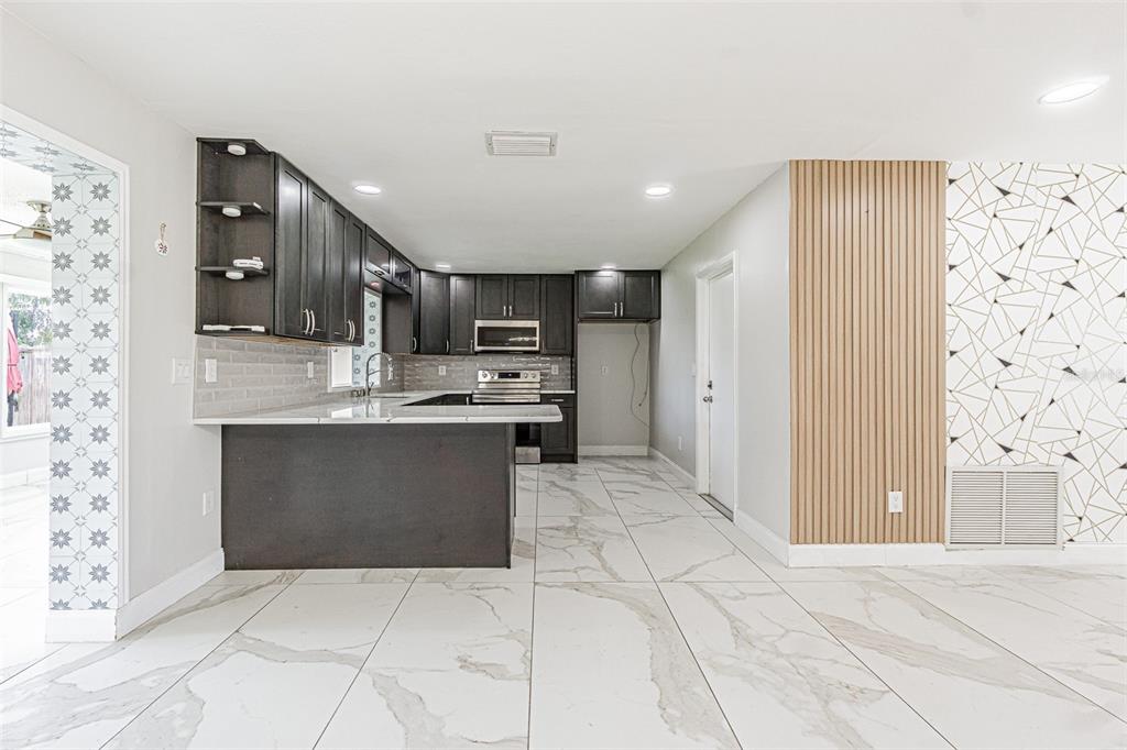 8024 Las Cruces Court Port Richey, FL 34668 - Photo 7 of 32