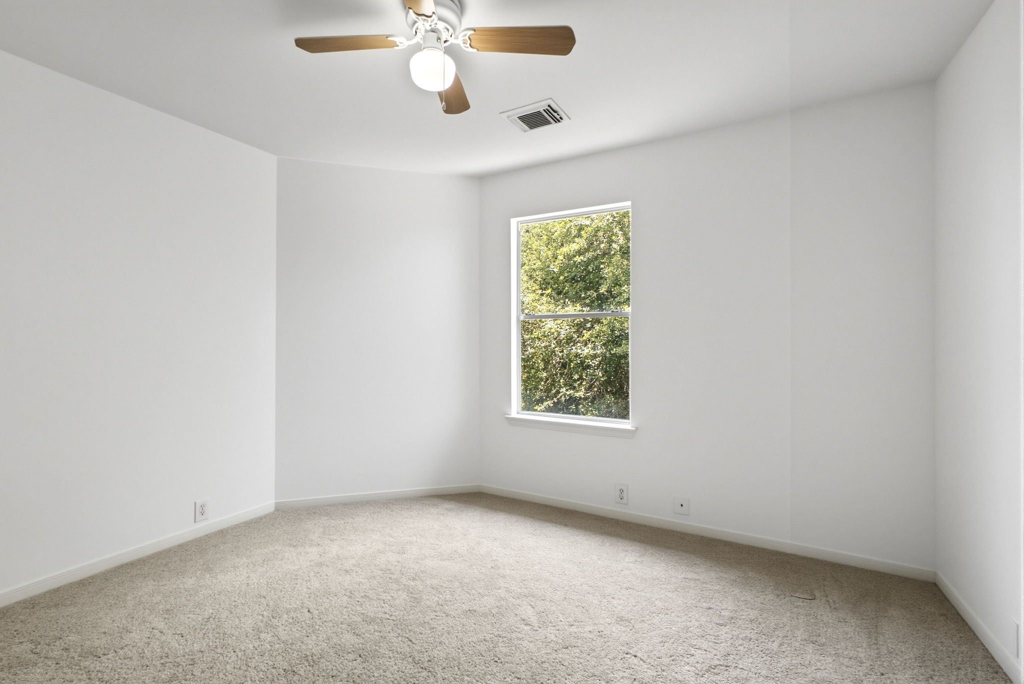 11907 Ezekiel Road Tomball, TX 77375 - Photo 31 of 39 an empty room with a window