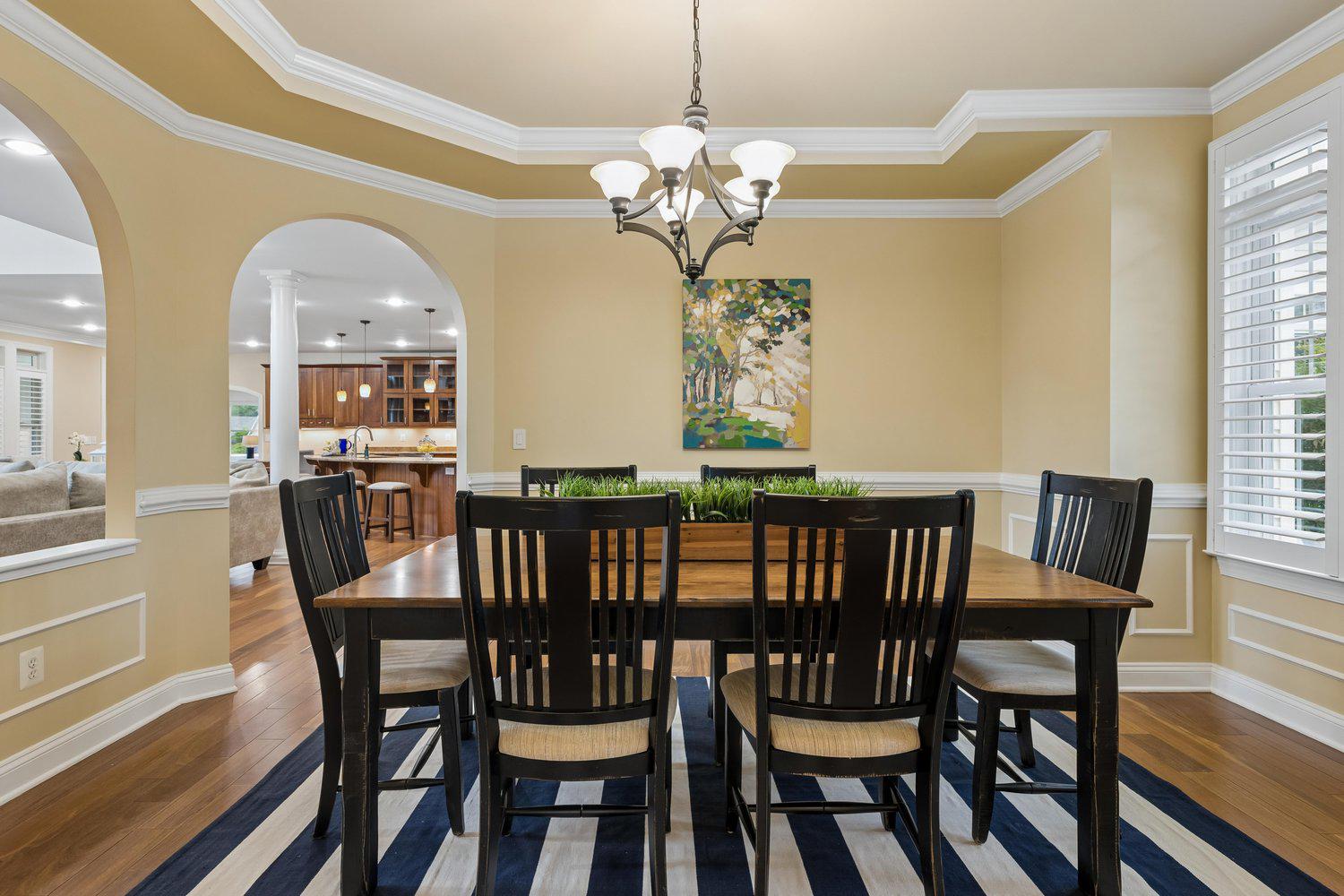 313 Wye Road Queenstown, MD 21658 - Photo 52 of 132 Elegant formal dining space with warm tones.
