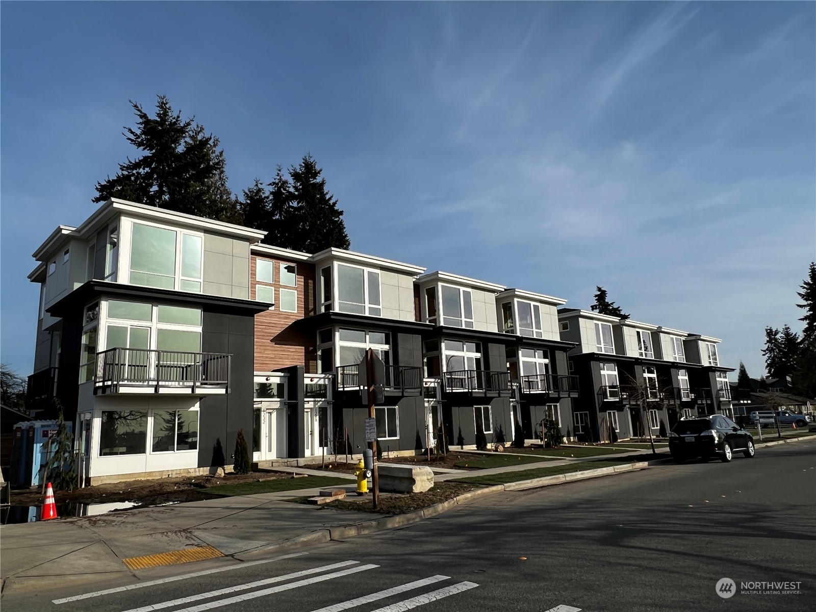 1232 Harrington Avenue Northeast, Unit 1 Renton, WA 98056 - Photo 1 of 1 a front view of a building with street view