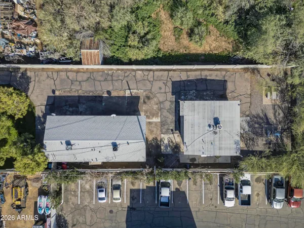 an aerial view of a house with wooden floor