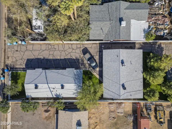 an aerial view of a house with a garden