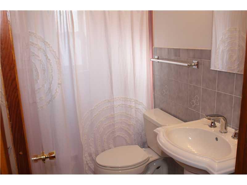 7 West Calvin Drive McKees Rocks, PA 15136 - Photo 19 of 20 Full Bath. Full bath on main level features brand new pedestal sink, toilet, and white marble floors!