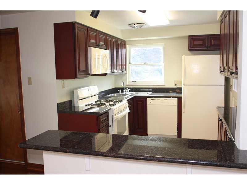 7 West Calvin Drive McKees Rocks, PA 15136 - Photo 7 of 20 Kitchen. Brand new kitchen with granite and maple cabinets.