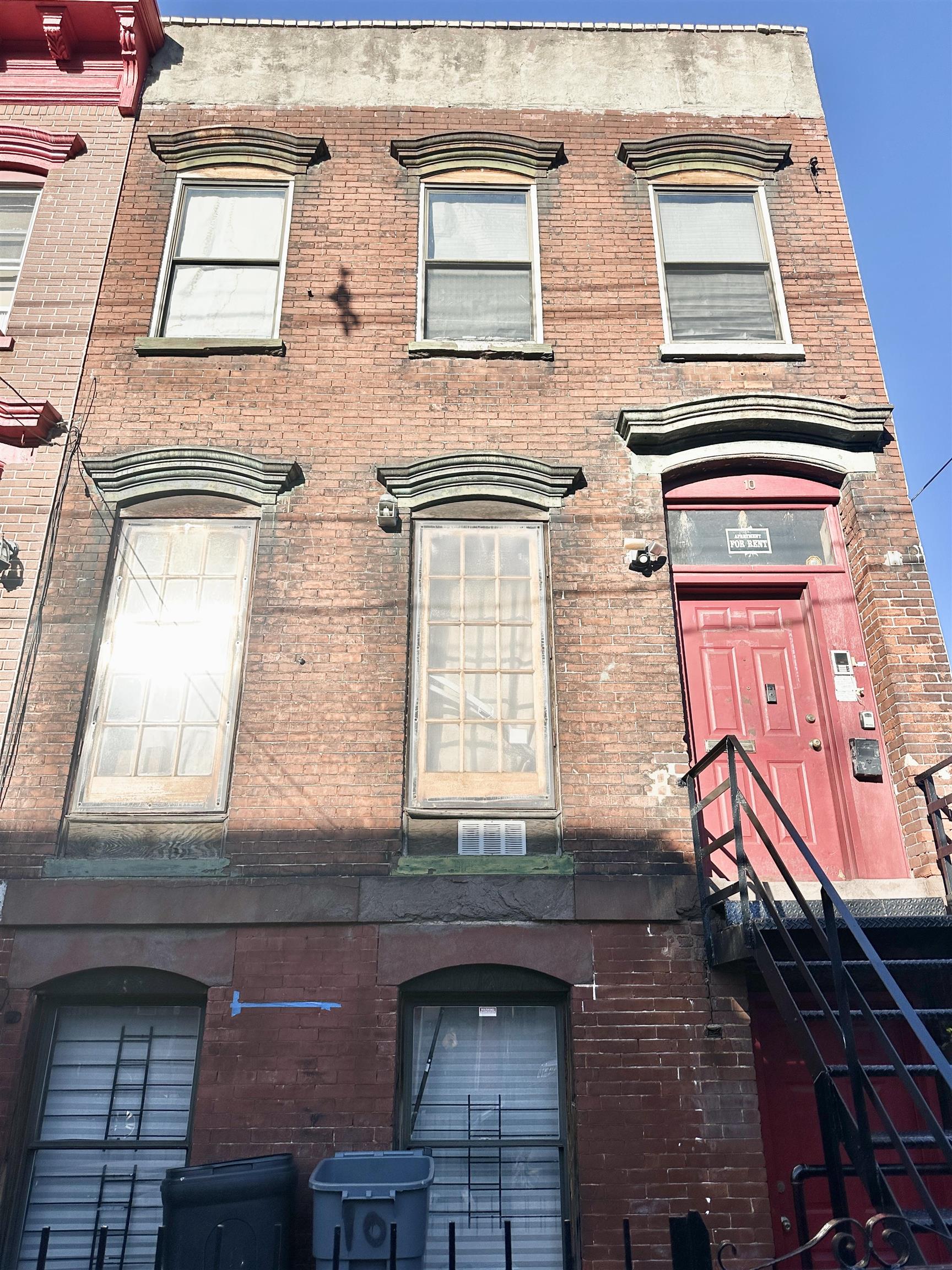 a brick building with a large windows