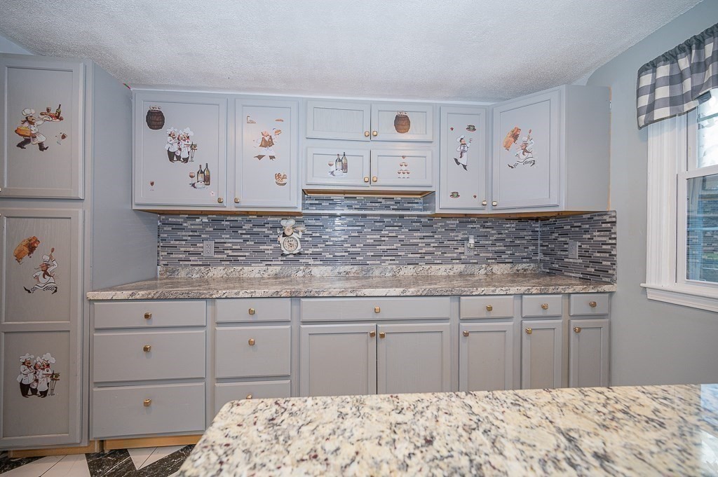 4 Kent Street Clinton, MA 01510 - Photo 13 of 39 a bathroom with a sink and a mirror