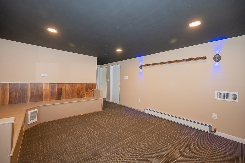 4 Kent Street Clinton, MA 01510 - Photo 22 of 39 a view of an empty room with a window