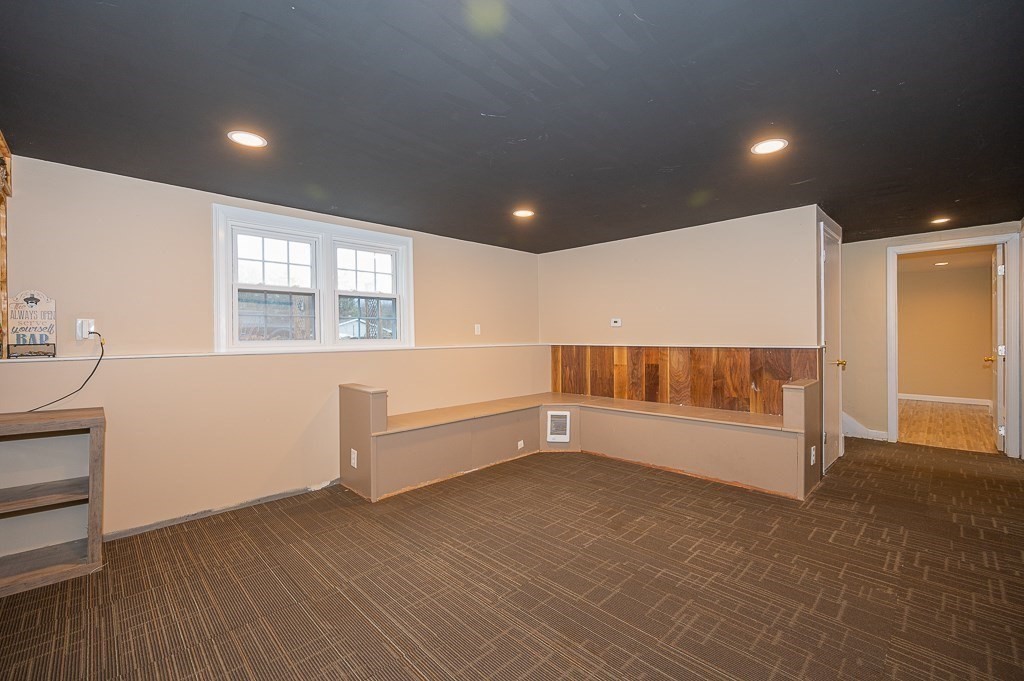 4 Kent Street Clinton, MA 01510 - Photo 24 of 39 a view of an empty room with a window