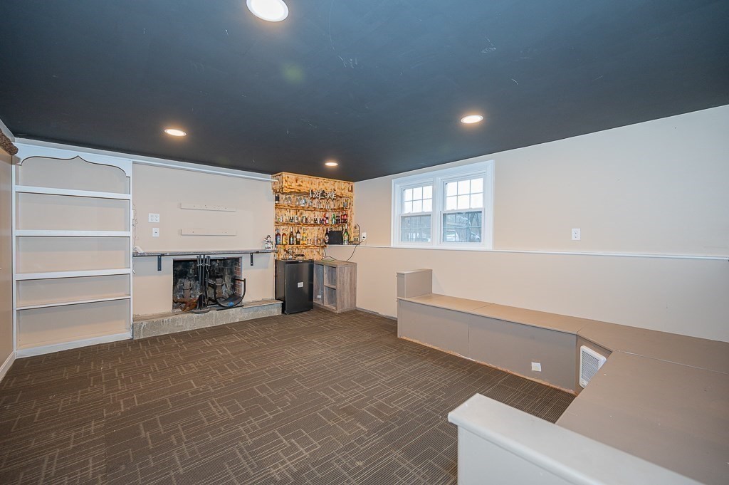4 Kent Street Clinton, MA 01510 - Photo 27 of 39 a view of a livingroom with a fireplace