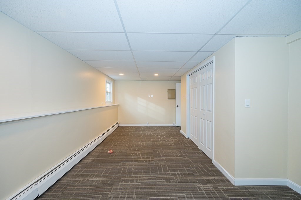 4 Kent Street Clinton, MA 01510 - Photo 31 of 39 a view of hallway with a window