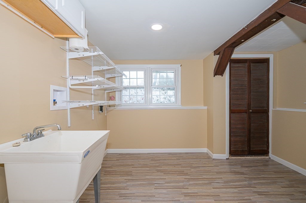 4 Kent Street Clinton, MA 01510 - Photo 35 of 39 a view of a kitchen with a sink and dishwasher