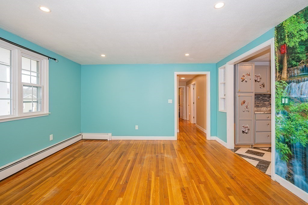 4 Kent Street Clinton, MA 01510 - Photo 10 of 39 a view of a room with wooden floor and entryway