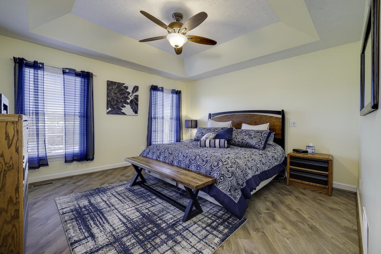 1709 Mt Solon Road Mount Solon, VA 22843 - Photo 22 of 75 a bedroom with a bed dresser and a window