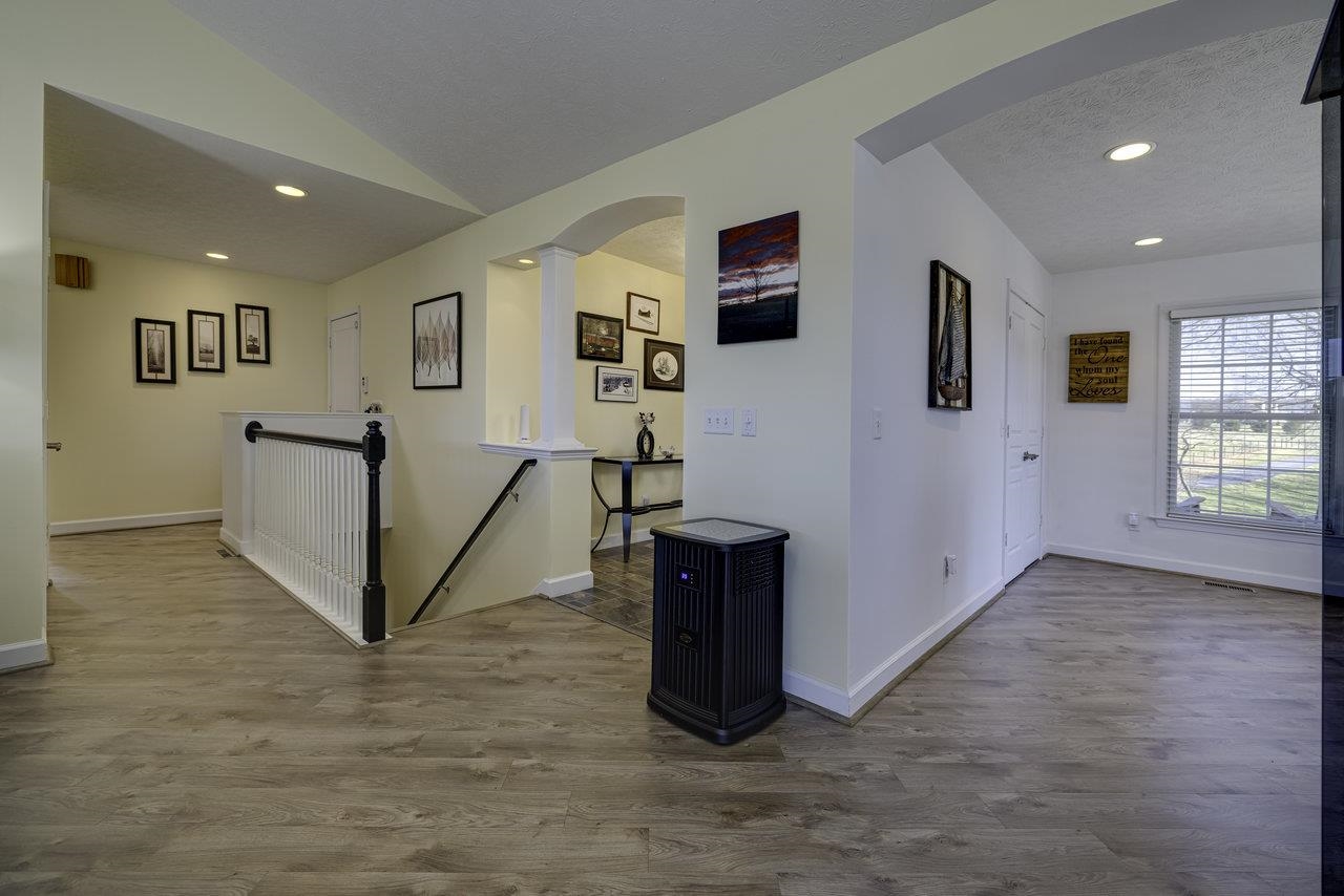 1709 Mt Solon Road Mount Solon, VA 22843 - Photo 24 of 75 a view of a livingroom with wooden floor and furniture