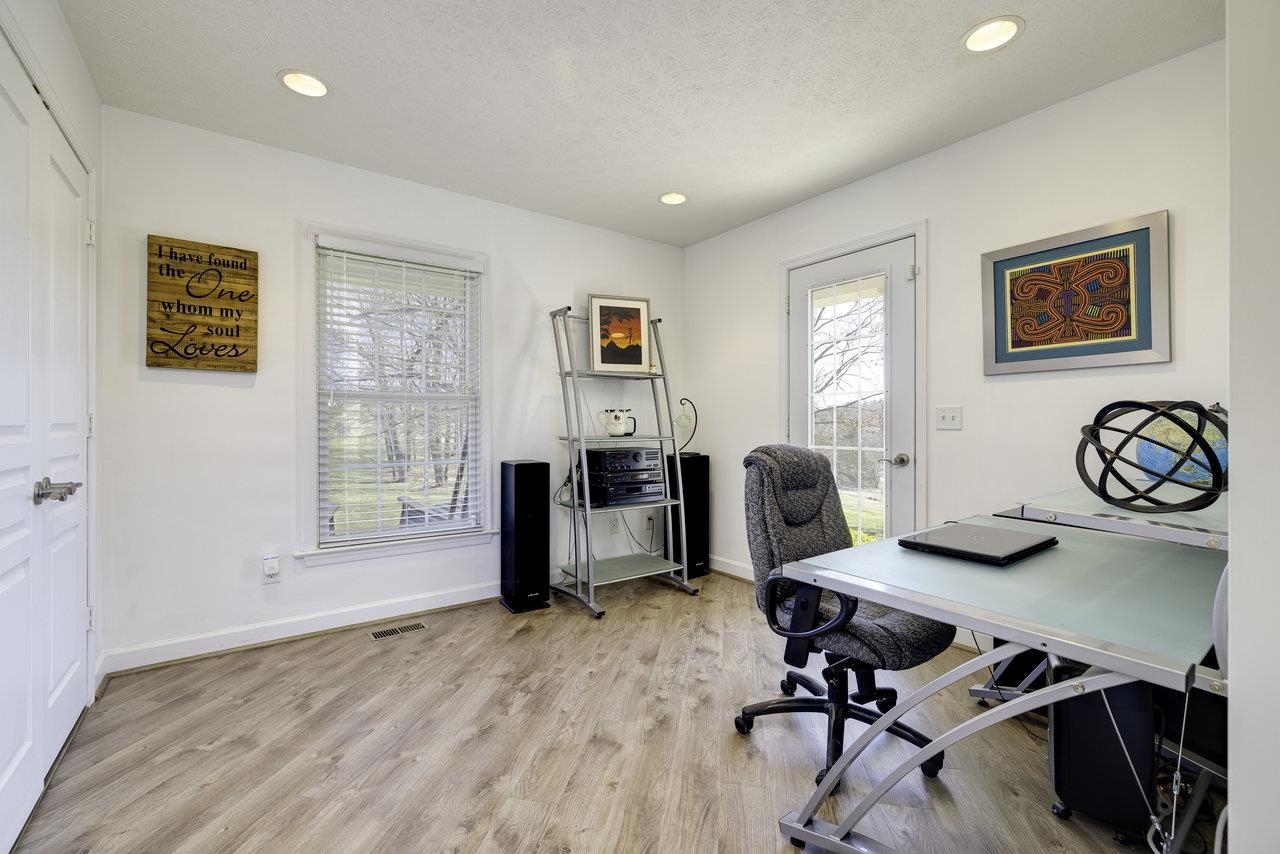 1709 Mt Solon Road Mount Solon, VA 22843 - Photo 26 of 75 a view of a workspace with furniture and a window