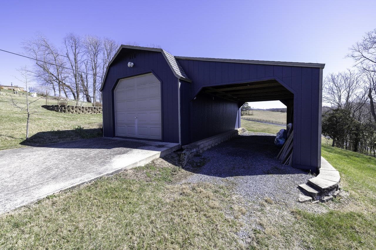 1709 Mt Solon Road Mount Solon, VA 22843 - Photo 59 of 75 a front view of a house with a yard