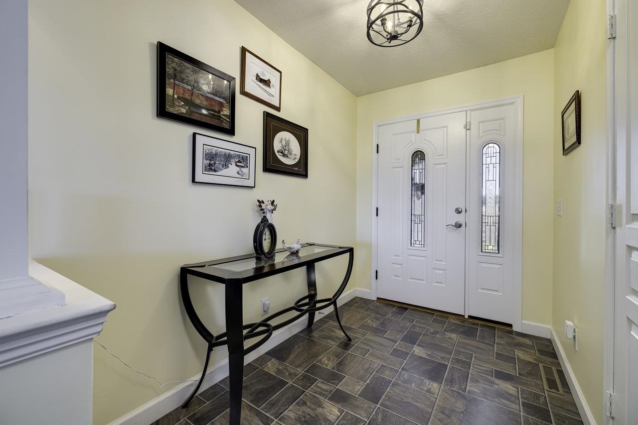 1709 Mt Solon Road Mount Solon, VA 22843 - Photo 10 of 75 a view of a hallway with paintings on the wall