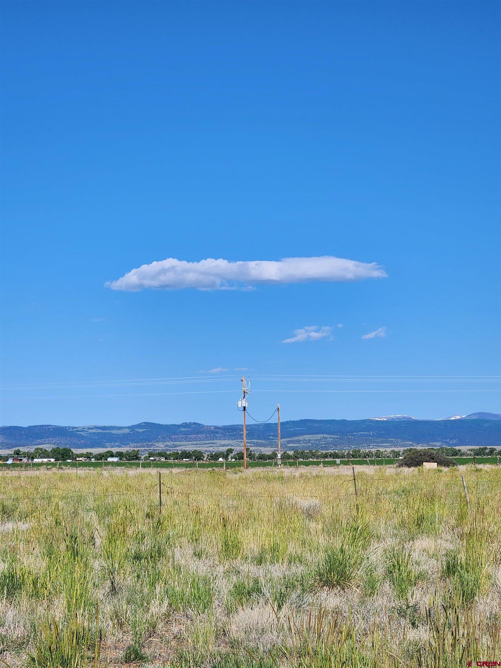 20596 County Road 8 Capulin, CO 81124 - Photo 6 of 8 a view of an ocean from a yard