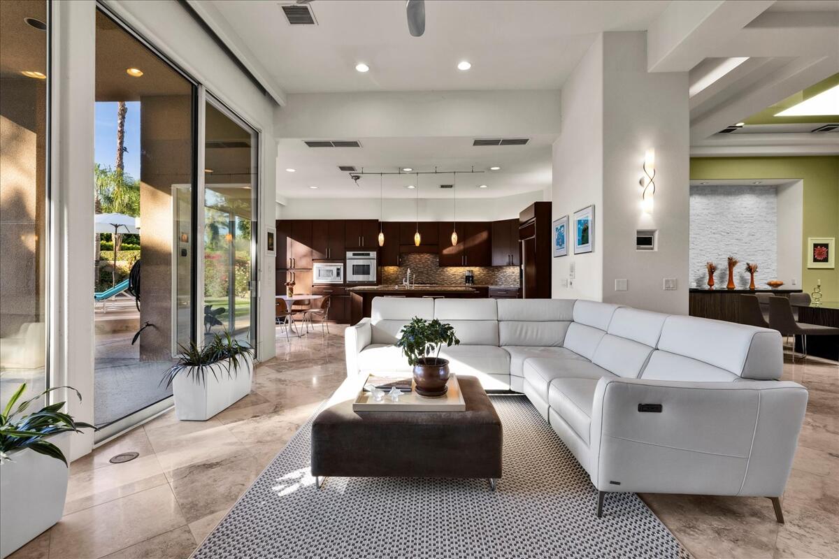 2 Silver Circle Rancho Mirage, CA 92270 - Photo 15 of 52 a living room with furniture and a fireplace
