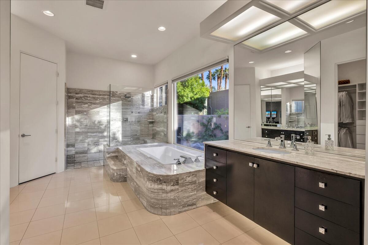 2 Silver Circle Rancho Mirage, CA 92270 - Photo 36 of 52 a large bathroom with a large tub and sink