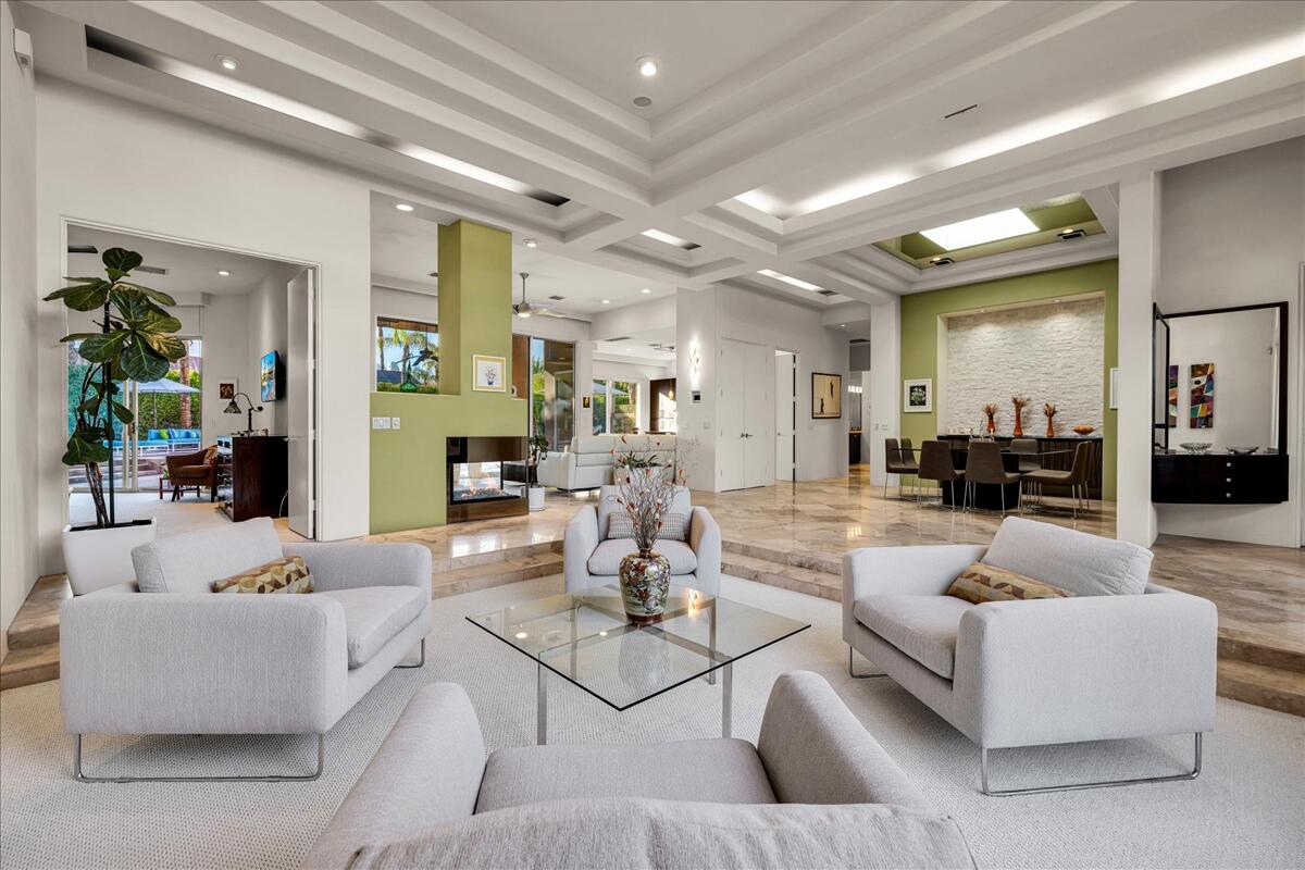 2 Silver Circle Rancho Mirage, CA 92270 - Photo 8 of 52 a living room with furniture and a large mirror