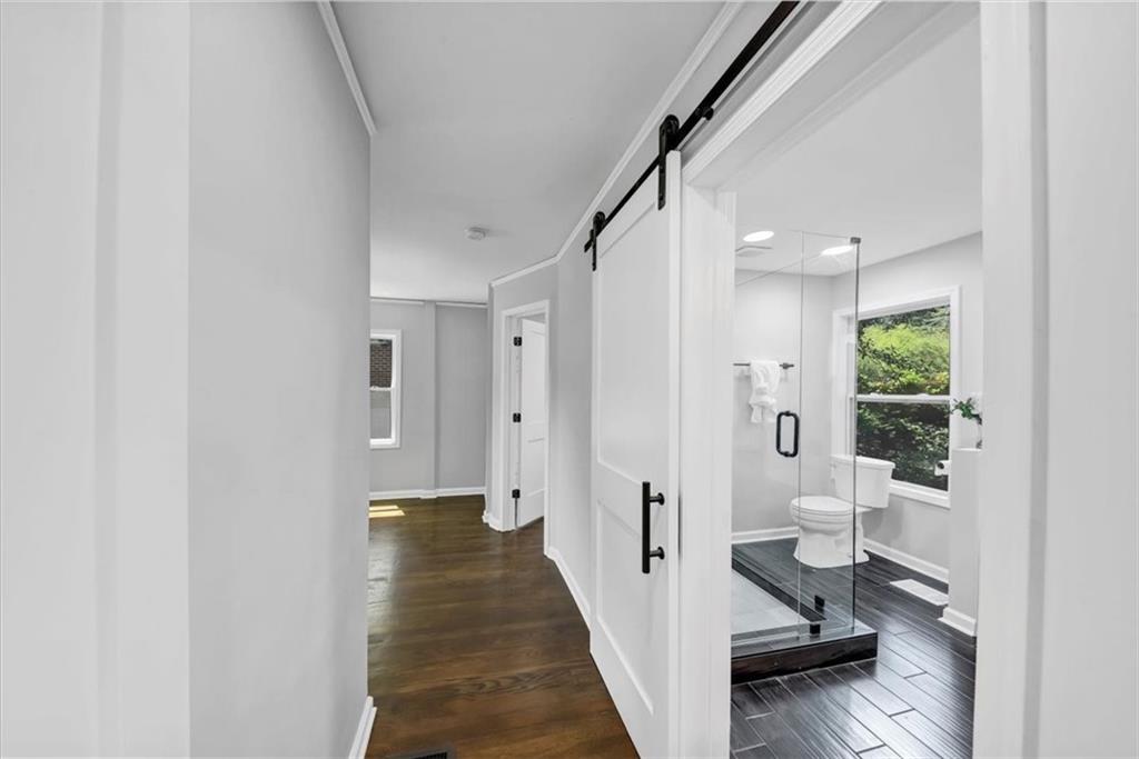 3423 Rugby Circle Atlanta, GA 30337 - Photo 23 of 44 a bathroom with a sink and a shower