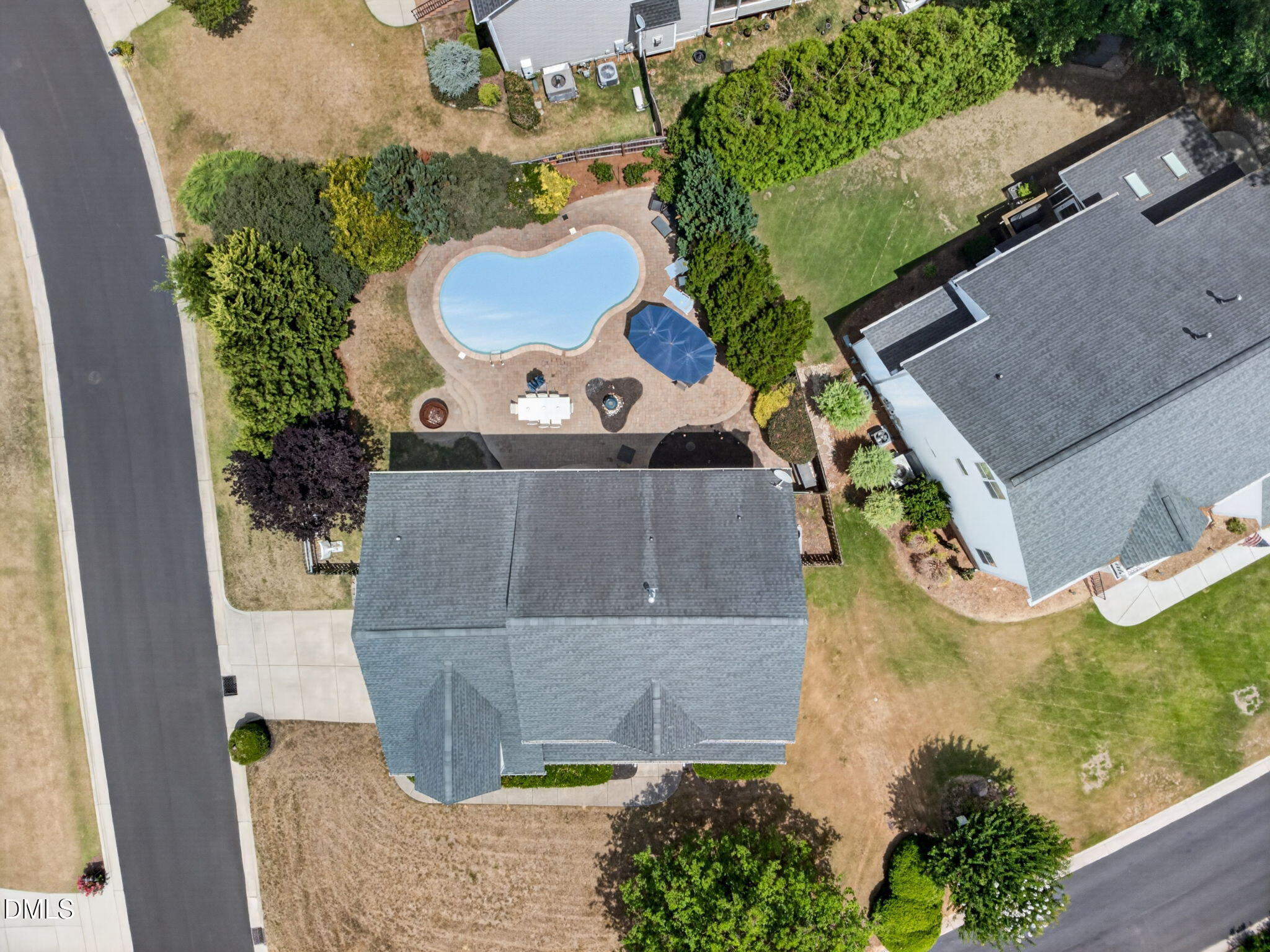 1258 Horsham Way Apex, NC 27502 - Photo 32 of 32 an aerial view of a house with a swimming pool