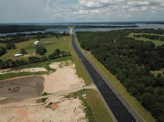 a view of swimming pool from a balcony