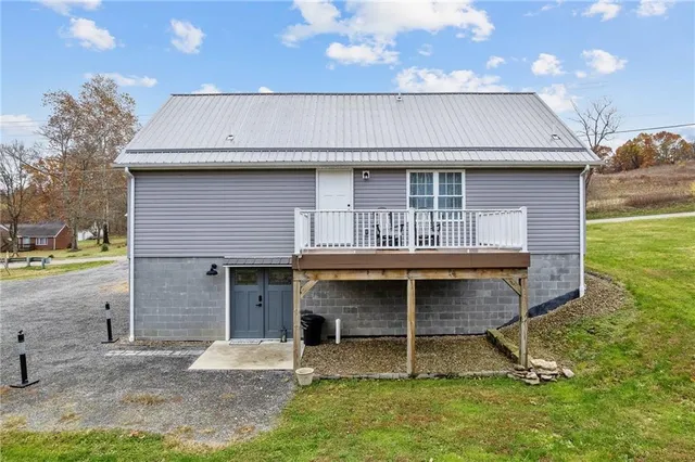 a house view with a backyard space